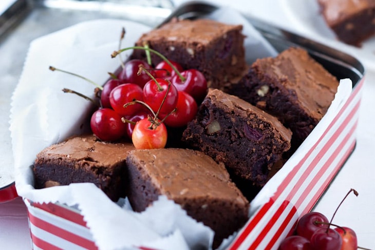 Chocolate brownies with cherries